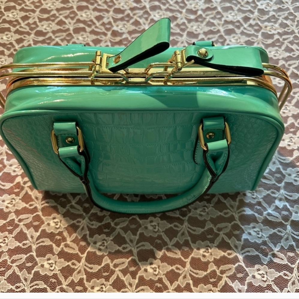 Large Beautiful Blue/Greenish Skinny bag; Lined; 2 Compartments, $80.